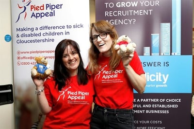 Simplicity swing into action with charity golf day